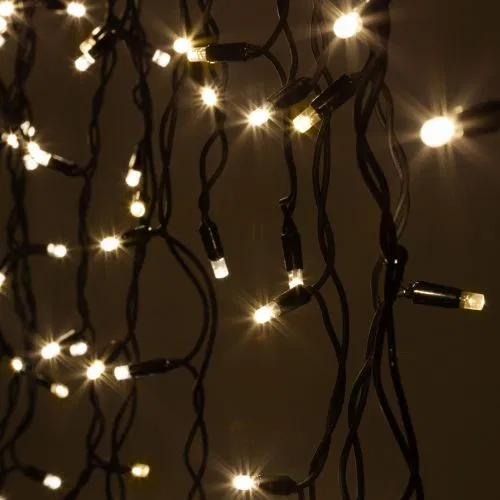 Гирлянда светодиодная "Нить" 10м 100LED тепл. бел. IP65 220В бел. мерцание провод черн. каучук (без шнура питания) Эра Б0051888